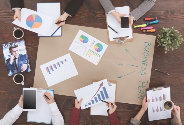 people-preparing-business-plan-PMM9WH8-637x433
