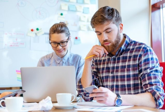 people-working-in-office-P3DBYE3-637x433